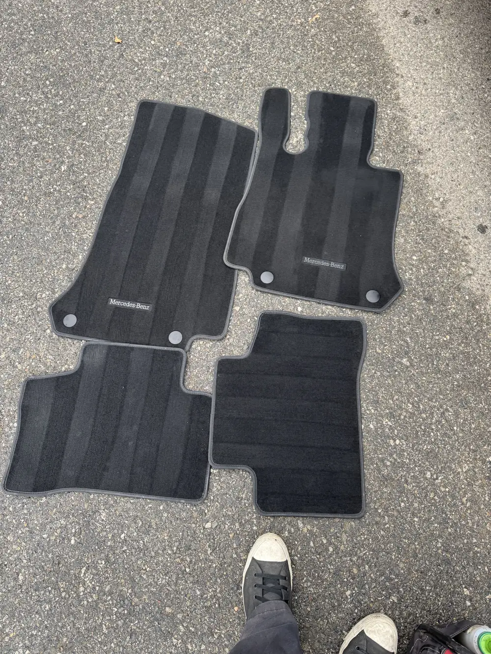 Clean floor mats with vacuum stripes after detailing
